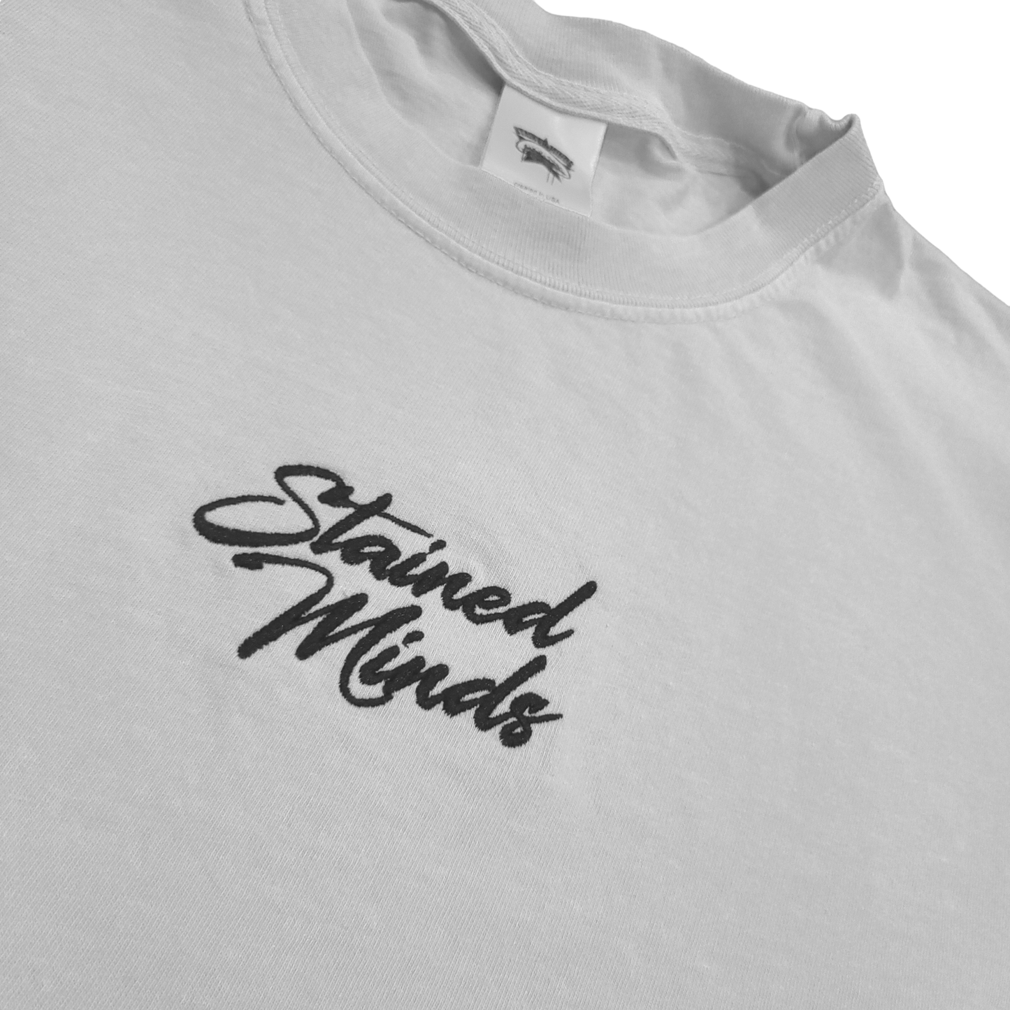 Simple Stainz - "Stained Minds" on a White Tee